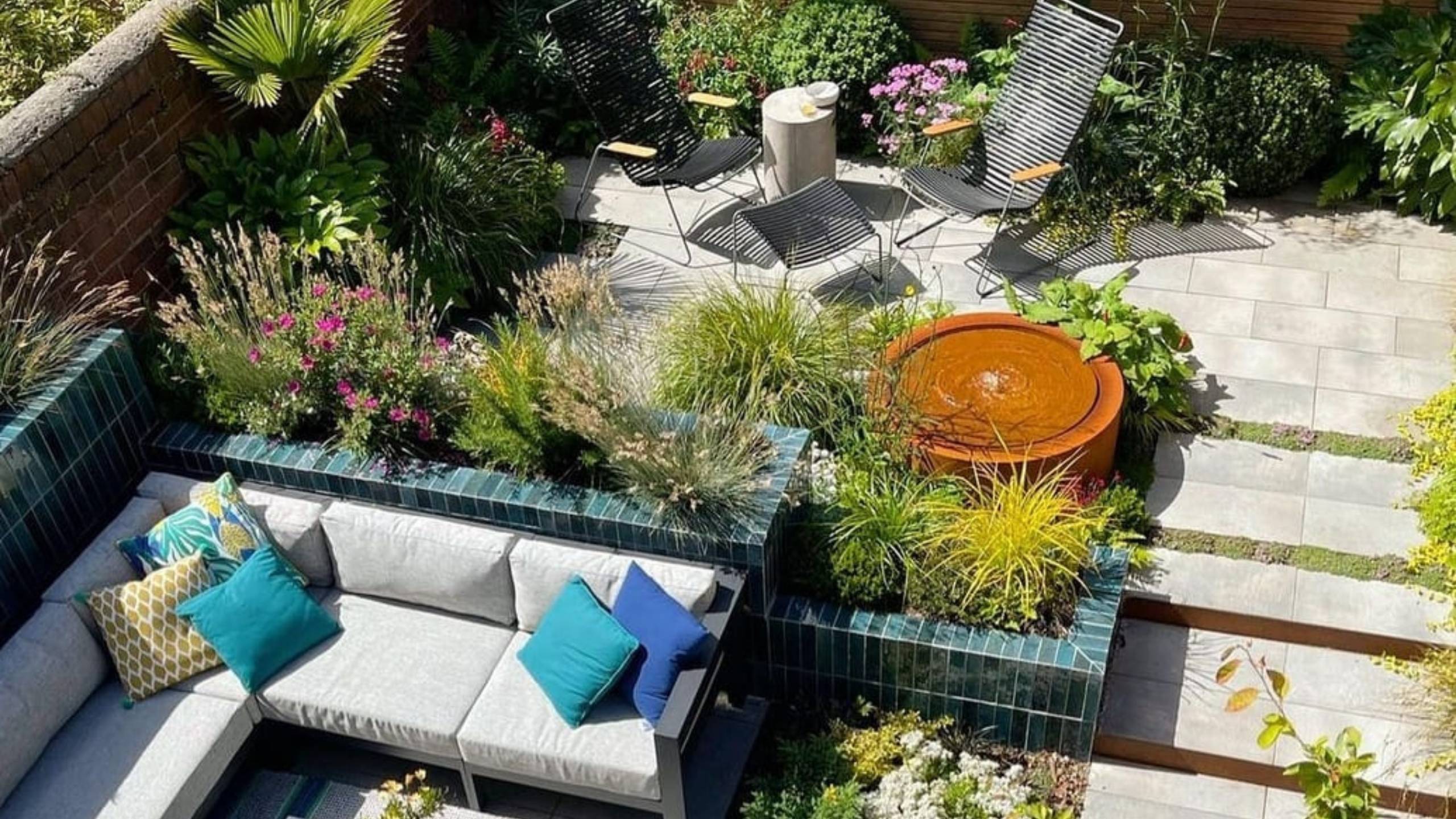 Sam Nattress Coastal Garden Whitley Bay clever-use-of-geometry-for-seating-and-porcelain-paving-corbridge-contemporary-garden